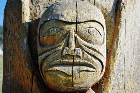 Old wood carving of a face